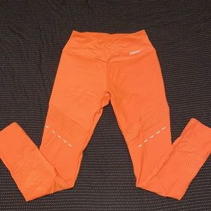 Never worn gym shark orange leggings
